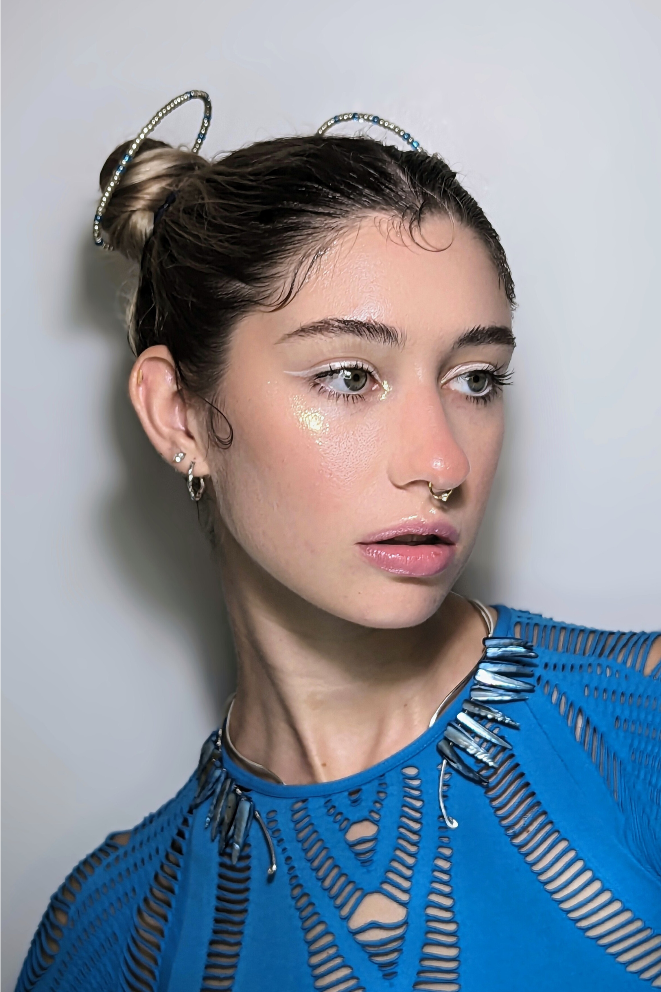 girl wearing space bun halos