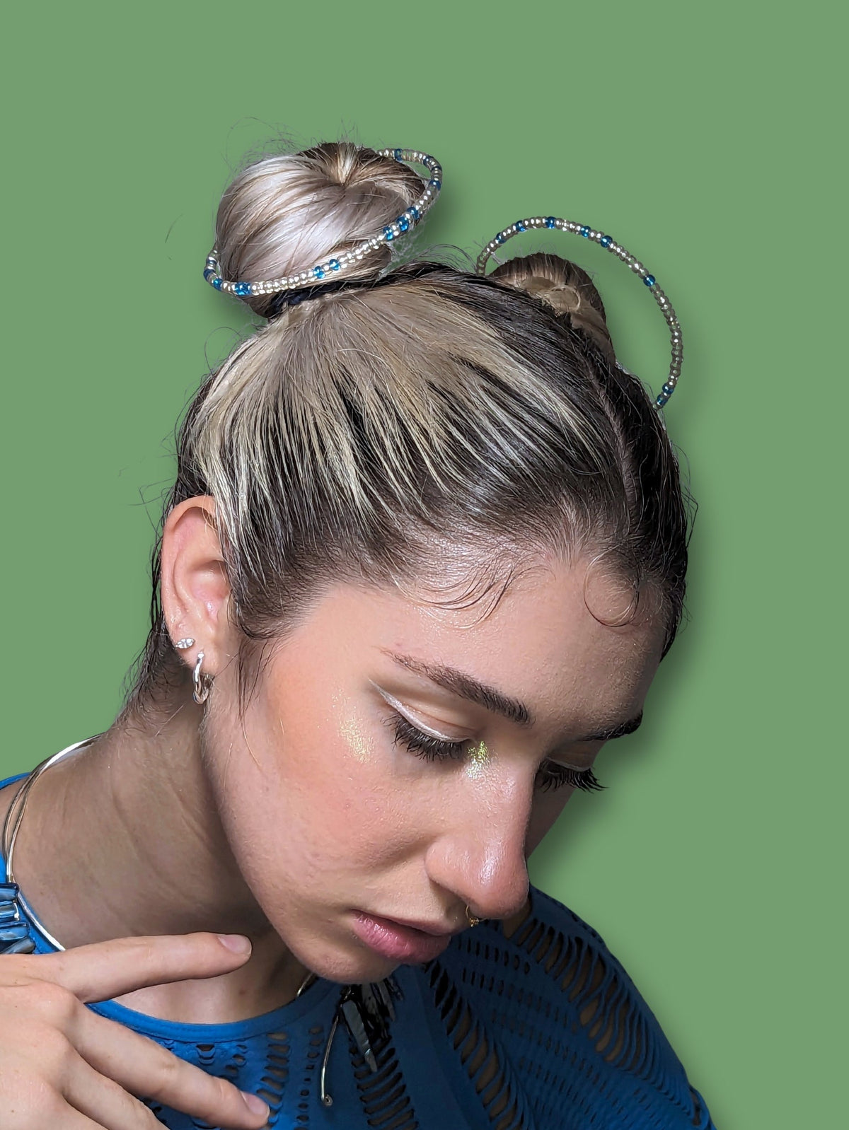 girl wearing space bun halos
